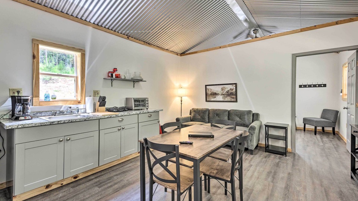 East Tallassee Cabin | Creekside Cabin Retreat w/Community Fire Pit