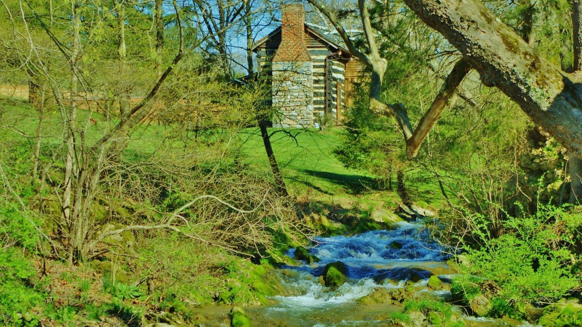 Raphine Cabin | Creekside historic log cabin with all modern amenities at historic Wade's Mill