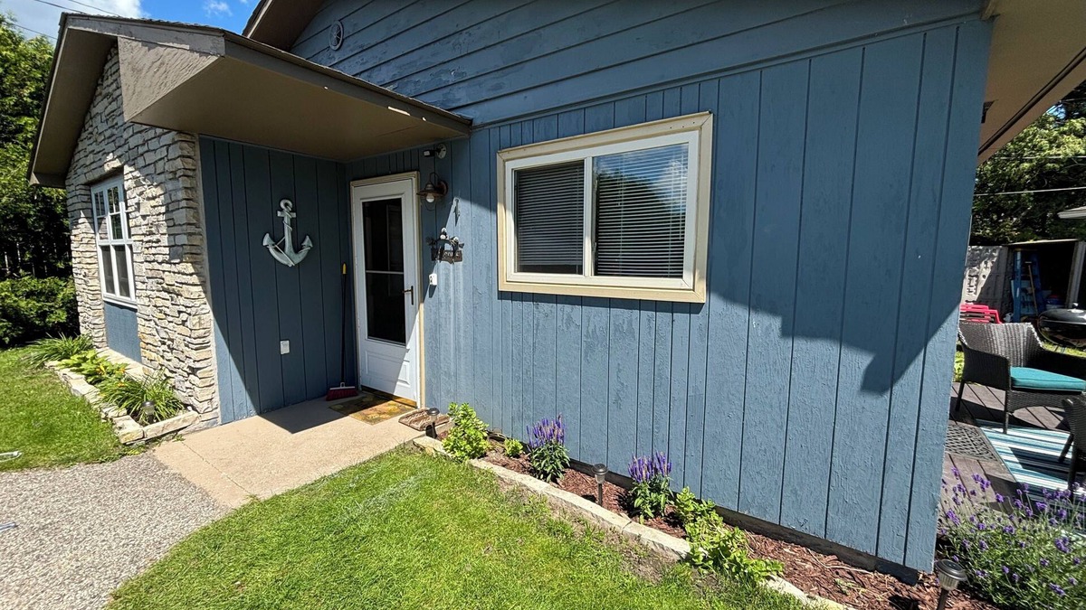 Oden Cottage | Crooked Lake Cottage with shared sandy beach and boat dock!