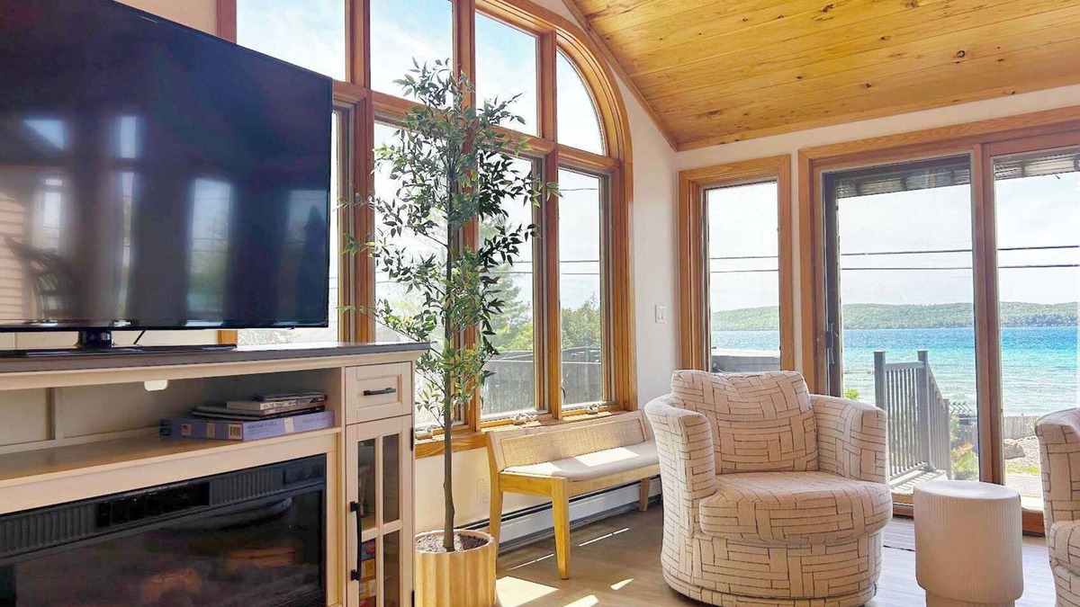 Lake Township House | Crystal Lake Hillside with Private Sandy Beach and Hot Tub!