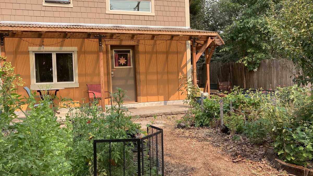 Friendly Ski Chalet | Custom Built Tiny House in an organic backyard garden