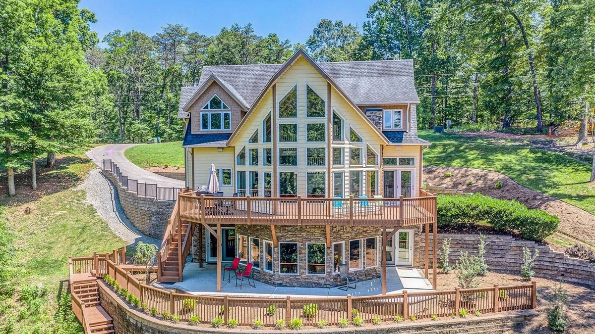 Moneta House | Custom Lakefront home with 2-story dock, Wifi, Game Room and Fireplace
