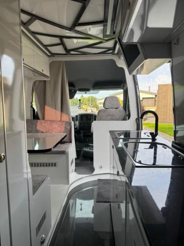 Hliðar Apartment | Custom made Mercedes sprinter RV