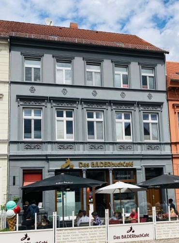 Havelberg Apartment | Das BilderbuchCafe - Ferien Apartment NO 5 - Markt 7