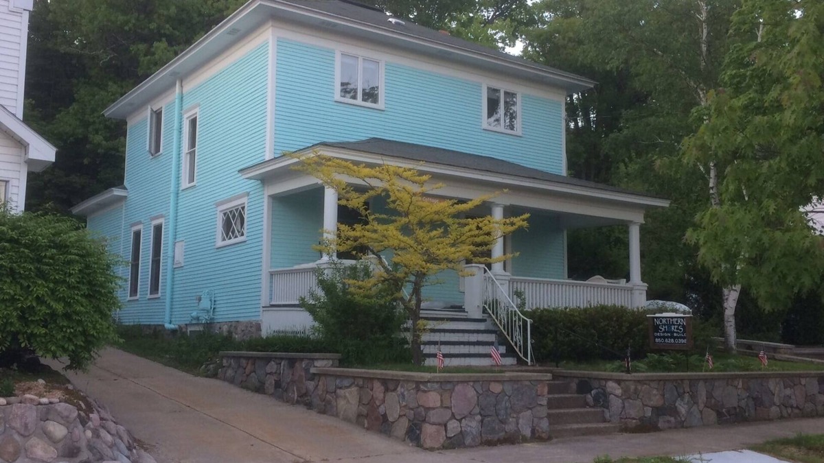Harbor Springs House | Daybreak Cottage Walk to Beach, Town and Yacht Club sit on the Front Porch