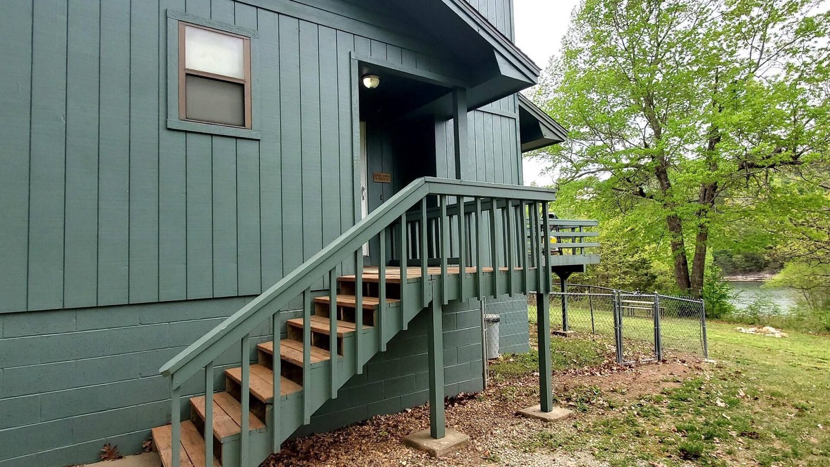 Holiday Island Condo | DECK OVERLOOKS THE PEACEFUL SERENITY OF THE LAKE