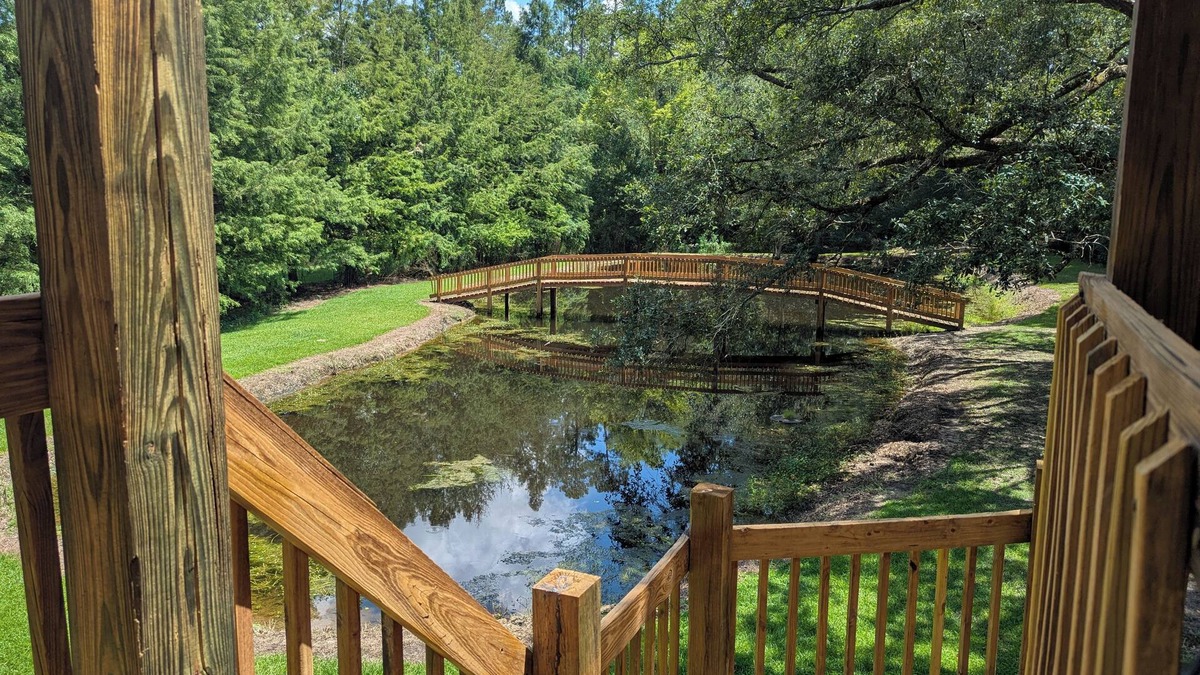 Picayune House | Delightful 4-BR with pond, deck, spacious yards in Picayune