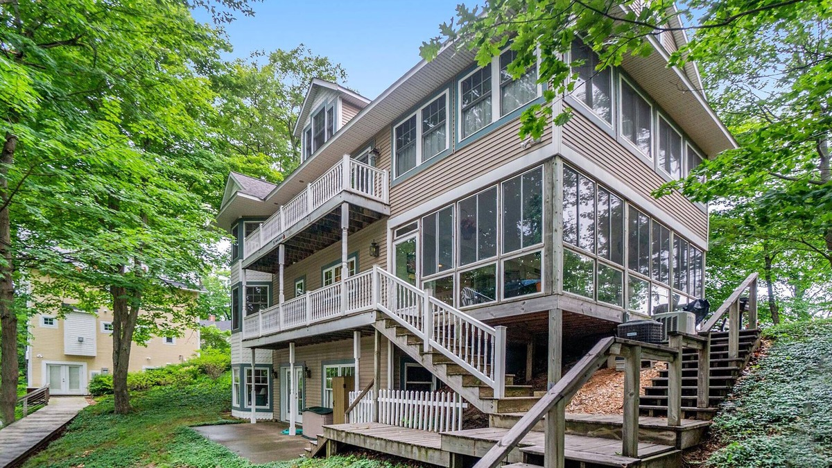Macatawa House | Delightful Private Wooded Setting Stunning Harbor Views, Private Beach Access, Tennis