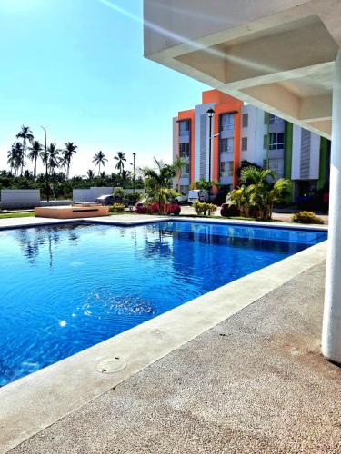 Acapulco Apartment | Departamento En Acapulco Diamante con Alberca, Camastros y Hermosos Jardines