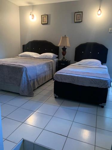 Piarco Bed & Breakfast | Derick's Inn