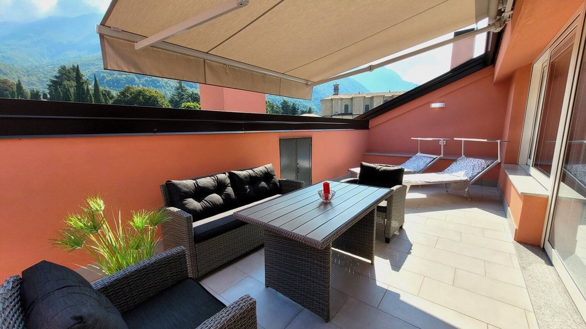 Pisogne Apartment | Design apartment with sun terrace and a 5-minute walk from the lake