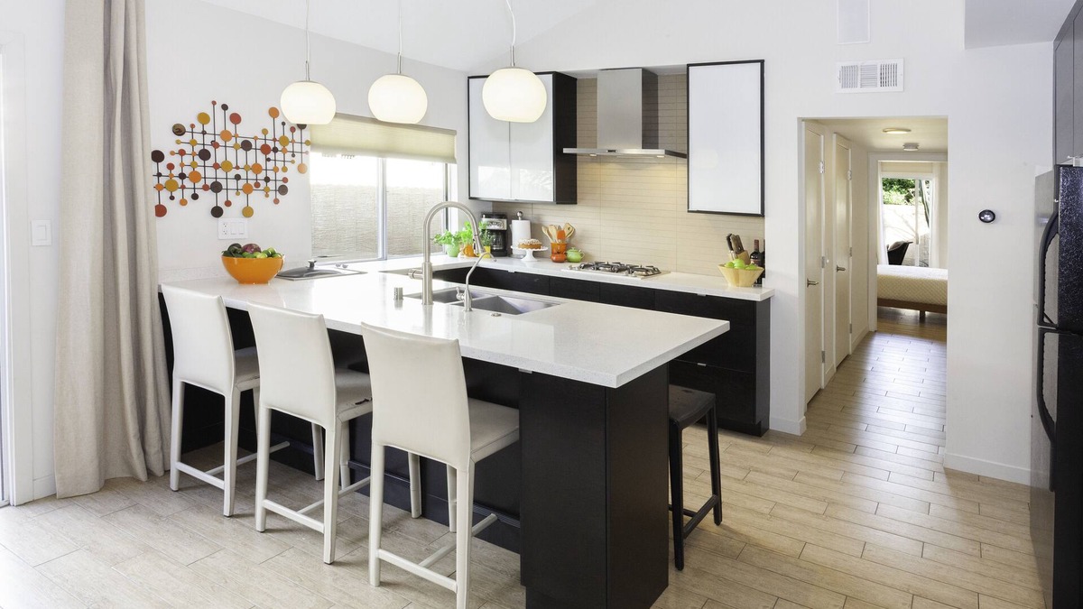 Uptown Design District Condo | Designer Condo With Wrap Around Patio Located in the Famous Movie Colony