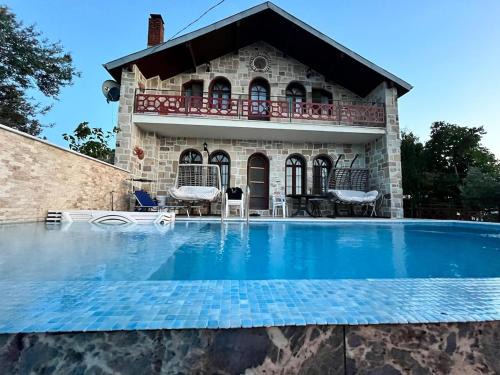 Burhaniye Villa | Detached Stone Villa with Pool Sleeps 9
