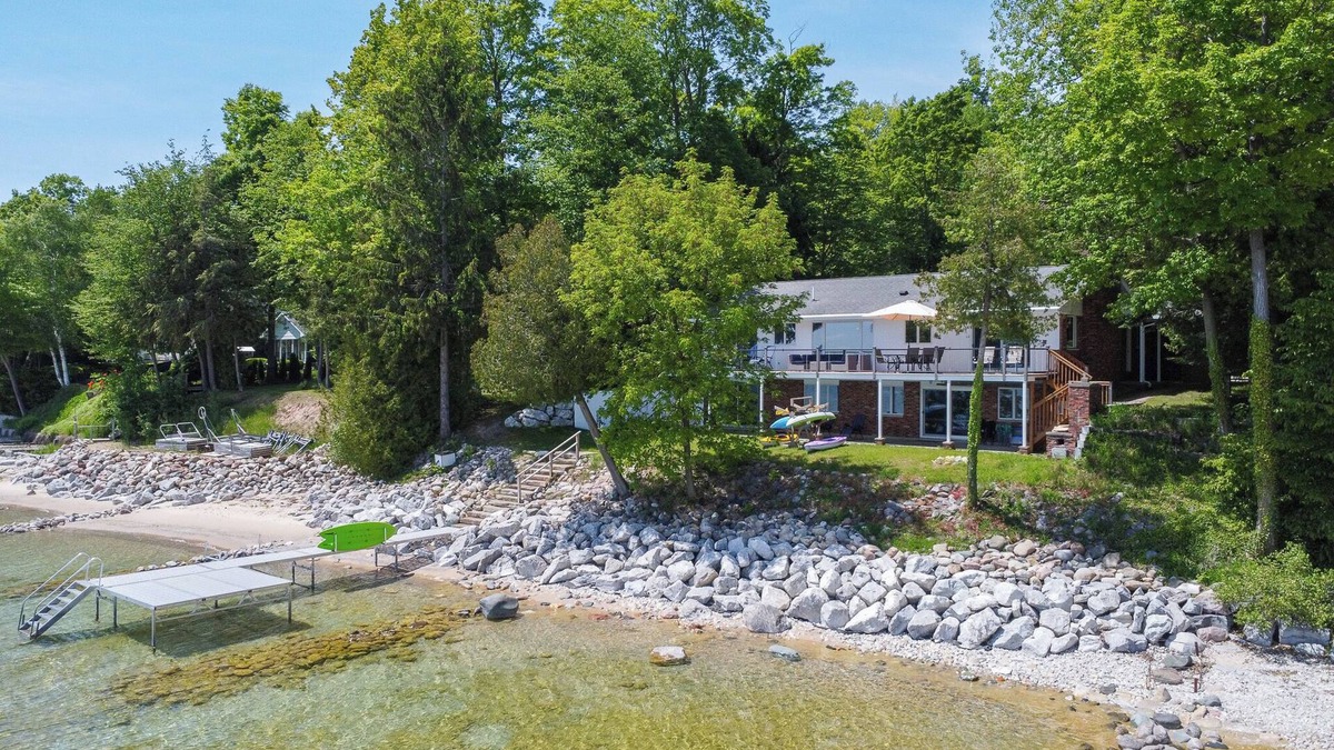 Suttons Bay House | Direct waterfront on West Grand Traverse Bay! Overlooking deck