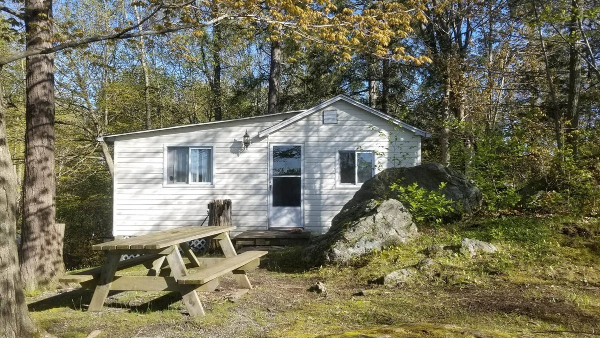 Frontenac Cabin | Discover Melody Lodge, Ontario's Best-Kept Secret Where Tranquil Nature, Adventure, and Comfort Await.