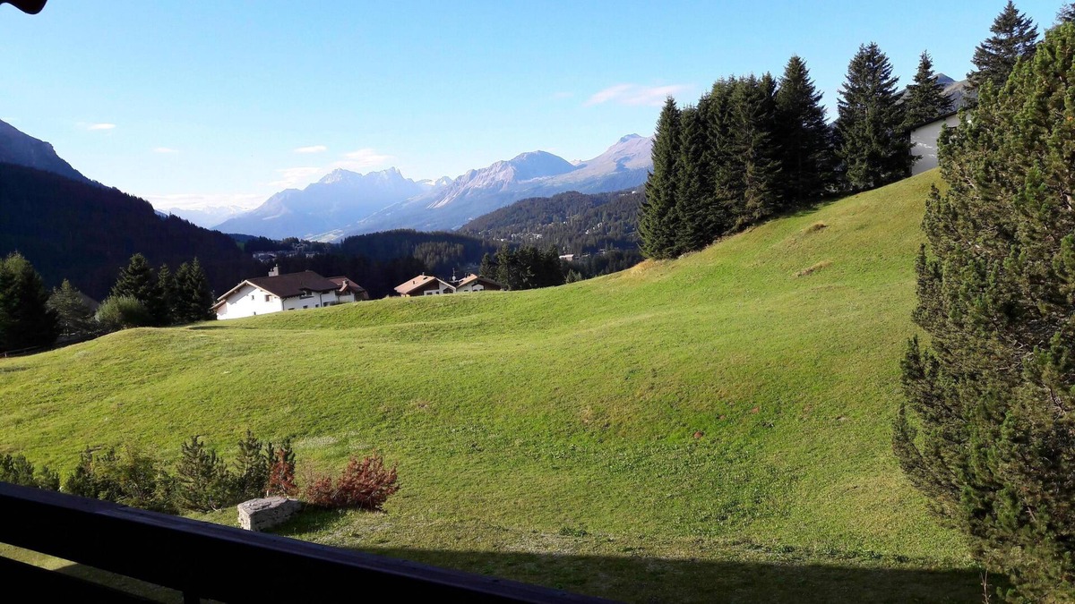 Valbella Apartment | Distant view and slope access