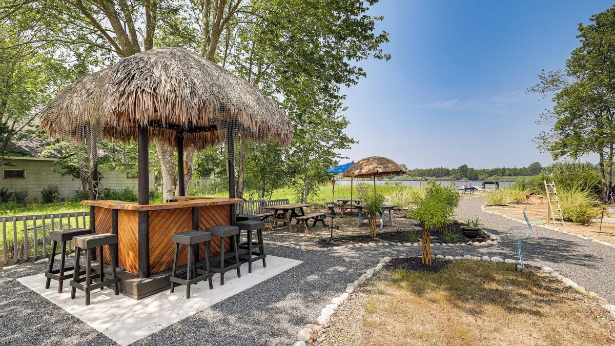 Waretown House | Dock + Backyard Bar: Spacious Barnegat Bay Retreat