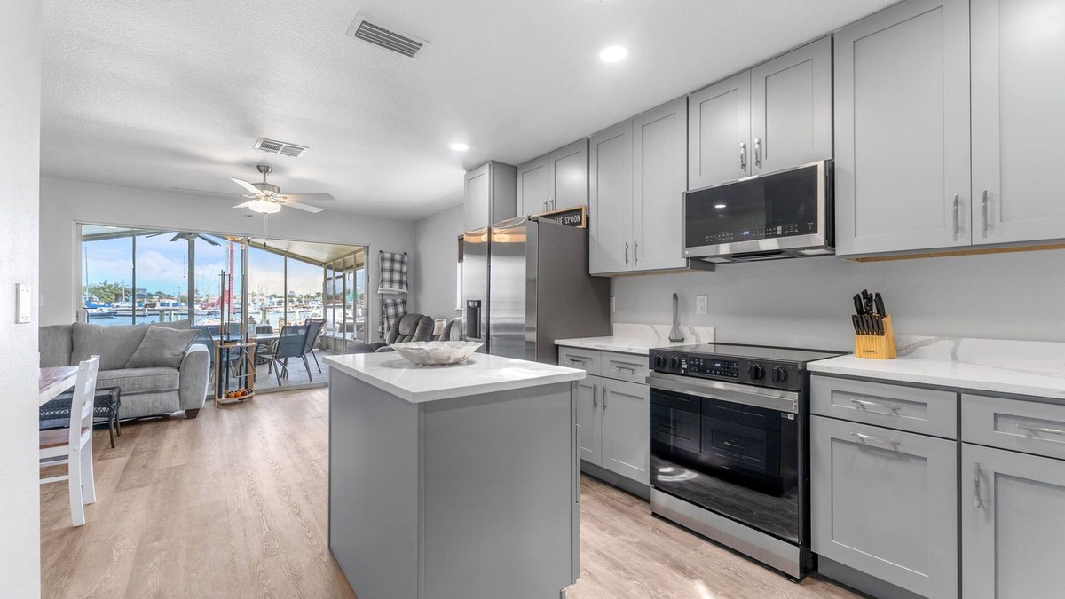 Flor-a-mar House | Dockside Delight! Waterfront Home + Boat Slip for Your Next Getaway