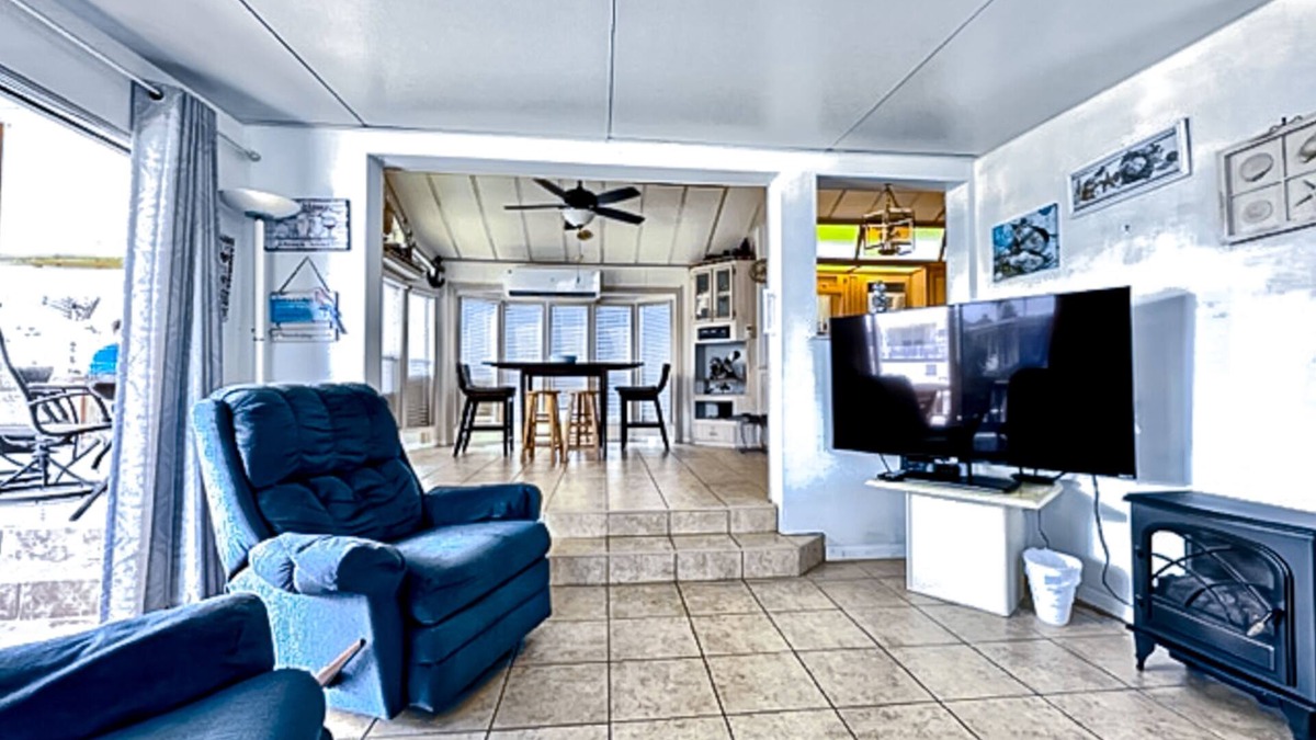 Port Isabel House | Dog-friendly bayfront home with in/outdoor pools, tennis, gym, W/D, bay views