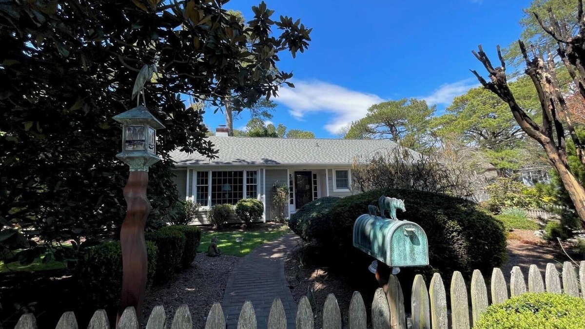 The Pines House | Dog-Friendly Beach Getaway with Koi Pond, Patio & Walkable to Town!