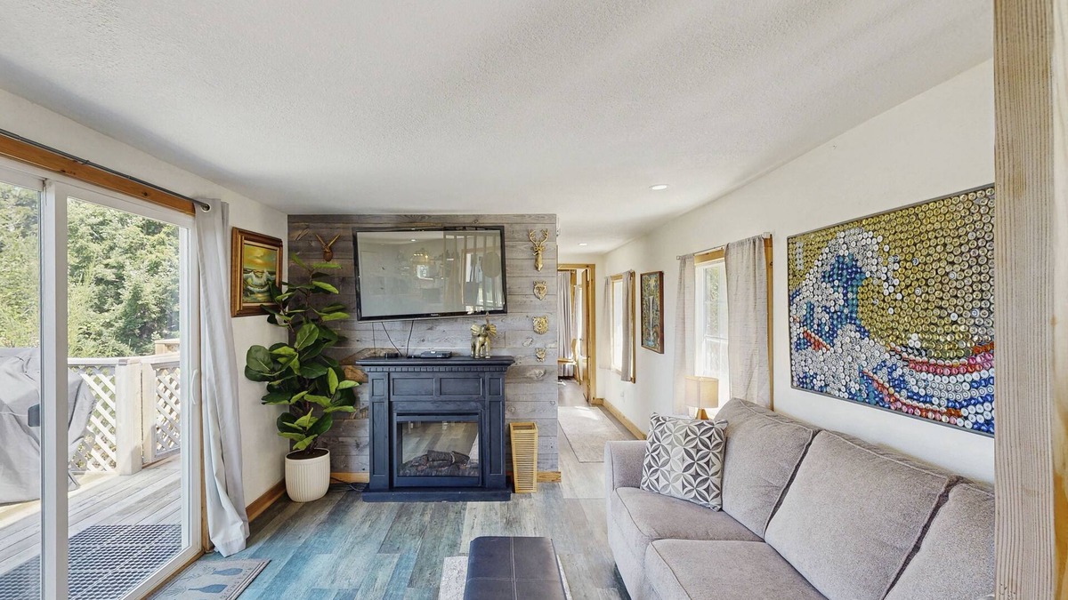 Port Orford Cabin | Dog-friendly cabin tucked Into the trees with WiFi, washer/dryer, & ocean views