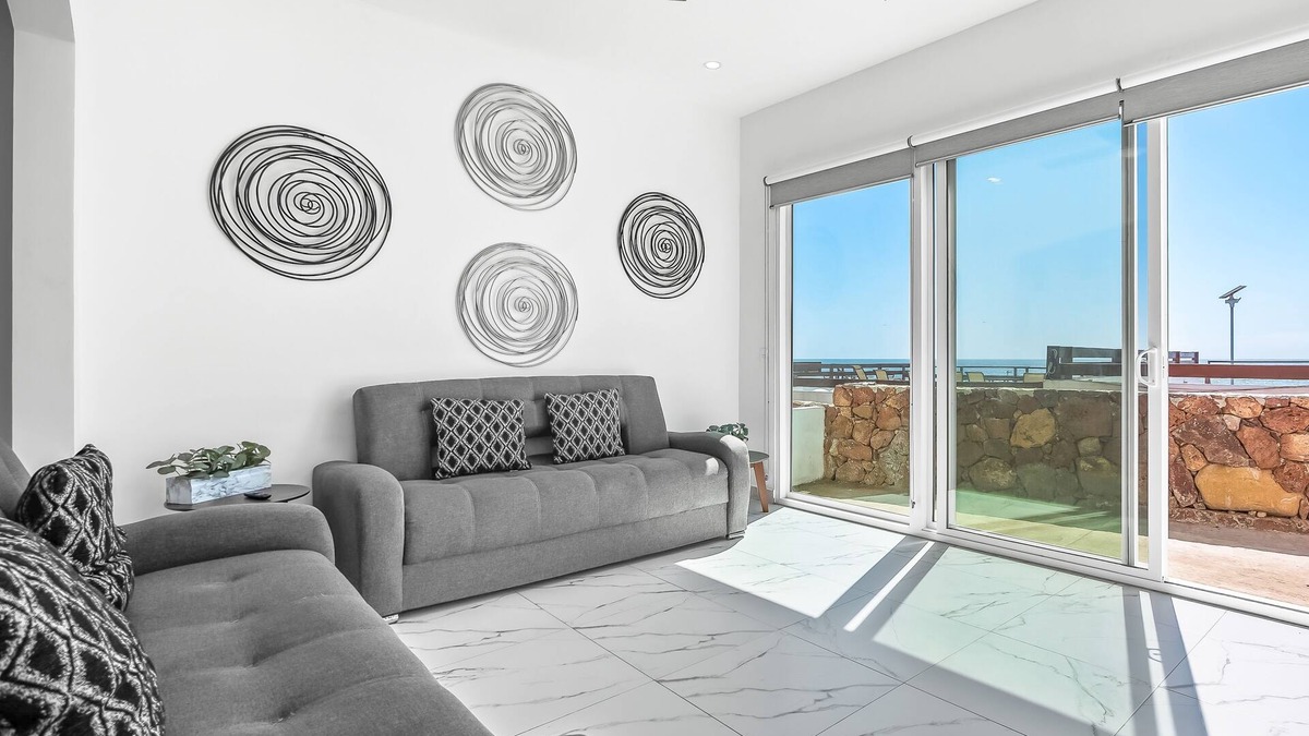 La Paloma House | Dog-friendly home with heated pool, hot tub, partial ocean views, & balcony