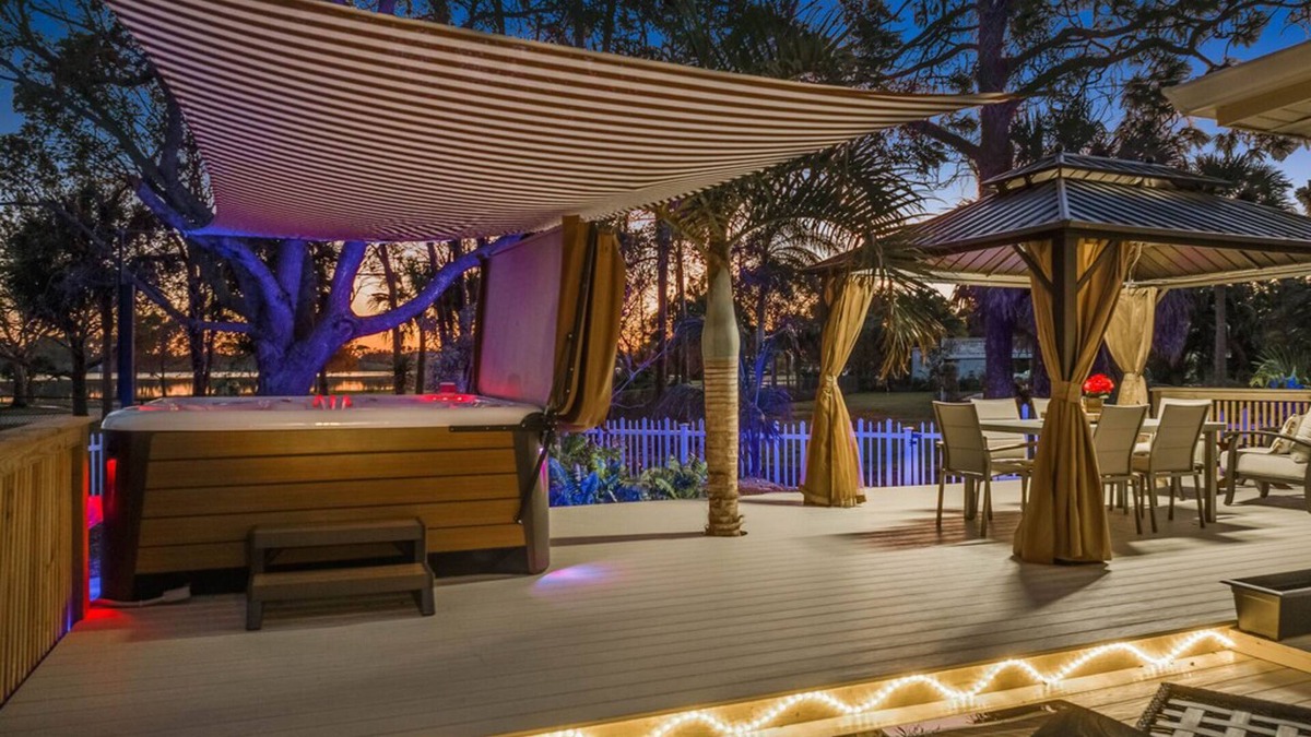 East Naples House | Dog-friendly lakefront home with hot tub, gazebo, firepit, outdoor kitchen, W/D