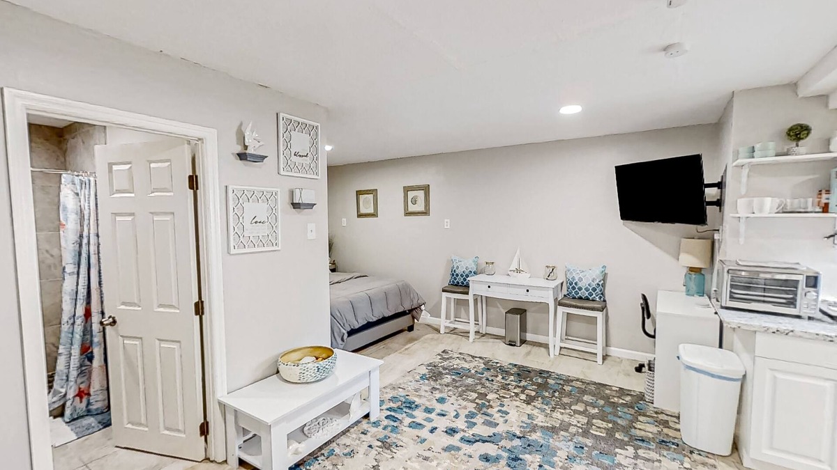 Bearss Plaza Apartment | Dog-friendly, lakeview retreat with kitchenette, yard, & electric grill