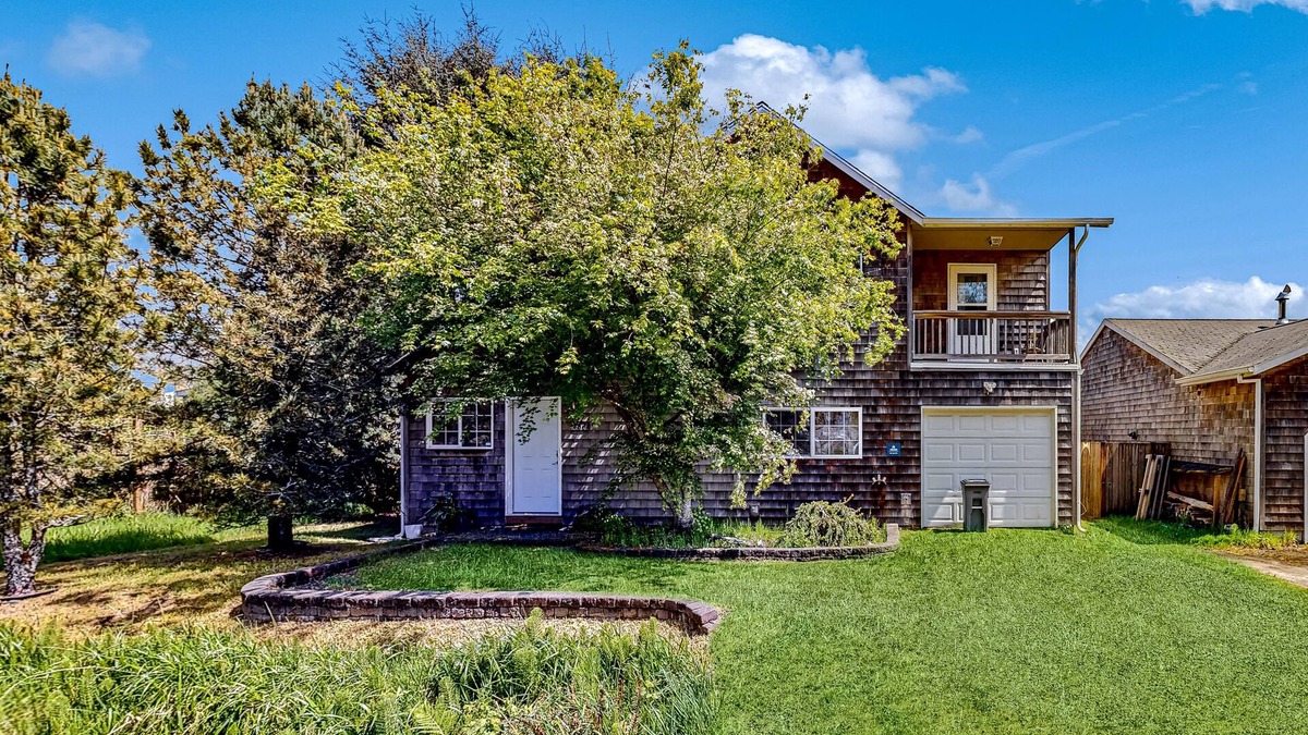 Nehalem House | Dog-friendly peaceful sanctuary with private hot tub, foosball, fireplace, W/D