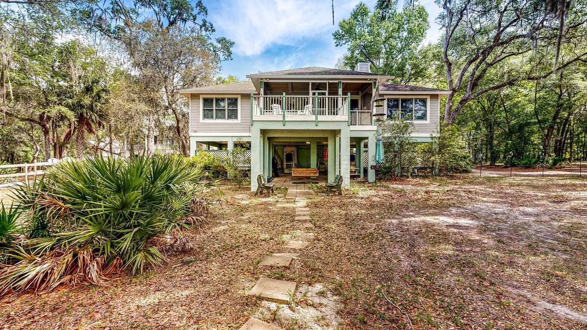 Bell House | Dog-friendly riverfront home - screened porch, 2 private docks, boat ramp access