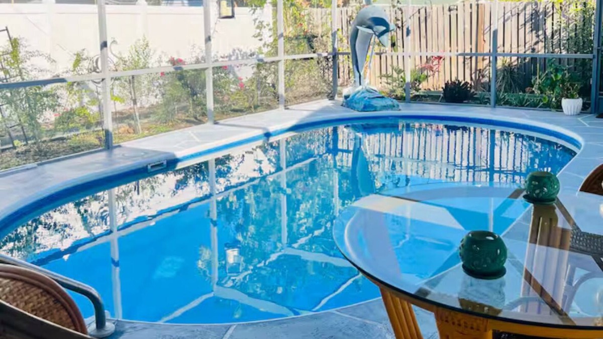 Regency Park House | Dog-Friendly Tropical Getaway with a Covered Pool -Nearby Beaches!