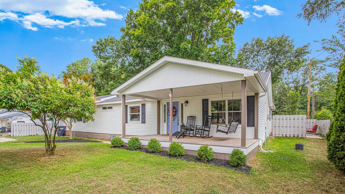 Paw Paw Lake House | Dog-friendly, updated home with deck, front porch, fire pit, WiFi, & fireplace