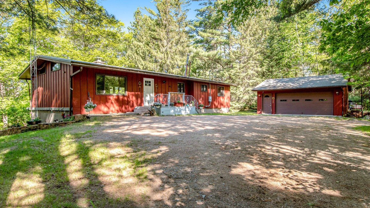 Manitowish Waters House | Dog-friendly, lakefront home with dock, kayaks, canoe, bike & fireplace
