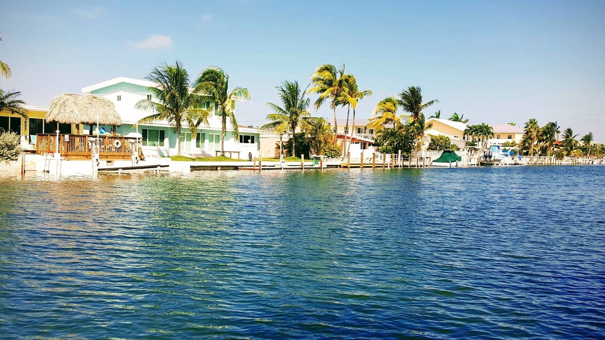 Key Colony Beach House | Dog-Friendly Waterfront House with 37ft Dock and Cabana Beach Club & Pool