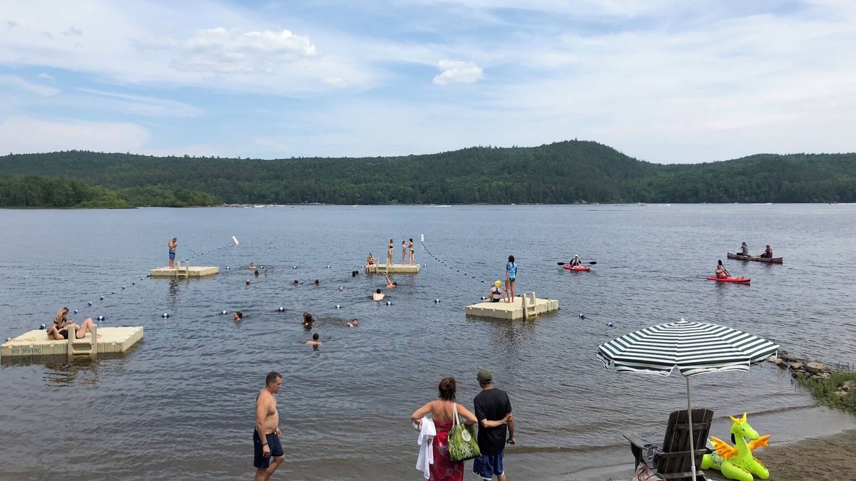 Schroon Lake Cottage | Dog friendly, wooded property; 3 BR cottage; private beach; tennis, boating