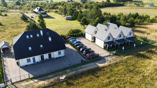 Postomino Ski Chalet | Domki i apartamenty "Nadmorska 27A"