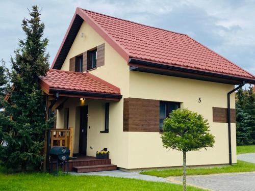 Karwie House | Domki Na Mazurskim Wzgórzu