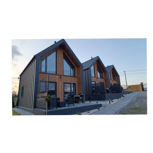 Krajno Pierwsze House | Domki Pod Łysicą- domki z basenem