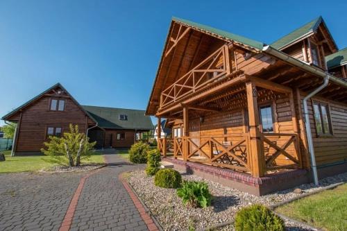 Grzybowo Resort | Domki w stylu góralskim Myśliwska 20