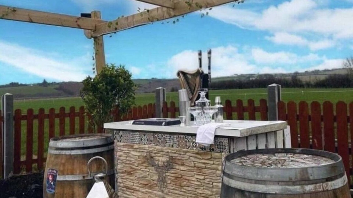 Ballinadee House | Double decker bus and hot tub/bar and patio