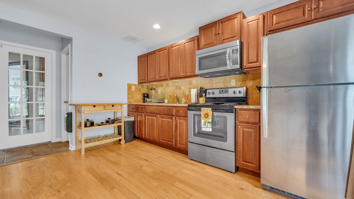 Buford House | Downstairs Unit - Pool + Tennis Access + Patio