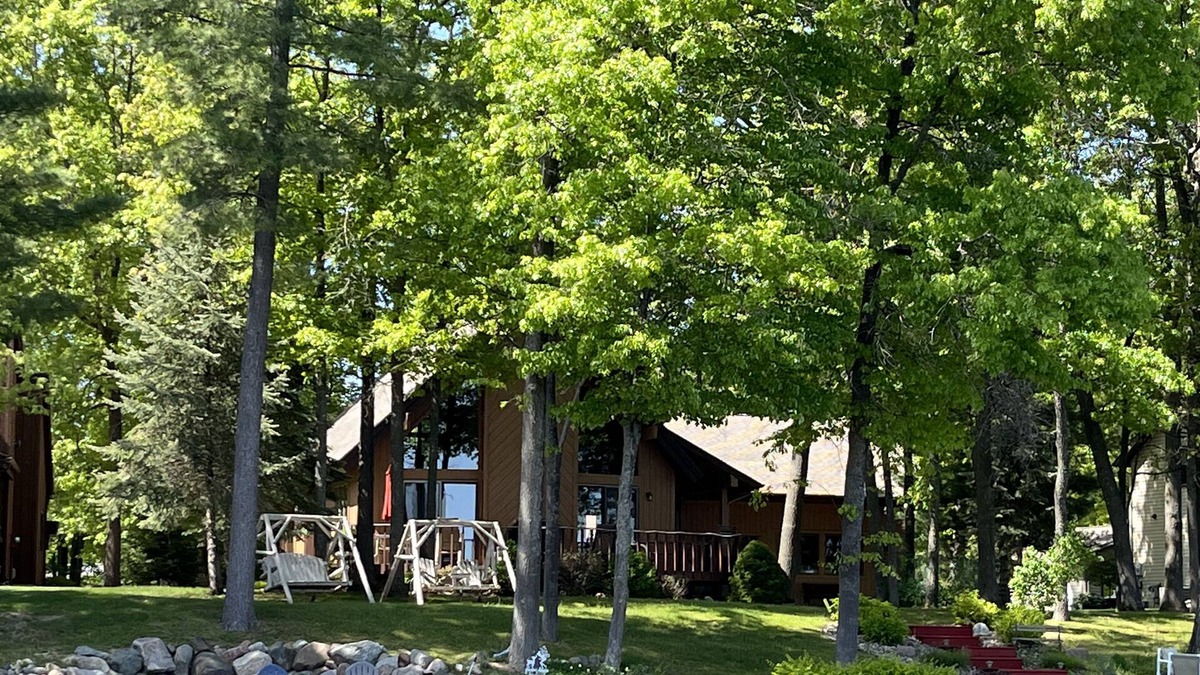Gladwin Ski Chalet | Dream Cottage w/ Sandy Beach, Dock, Pontoon Rental