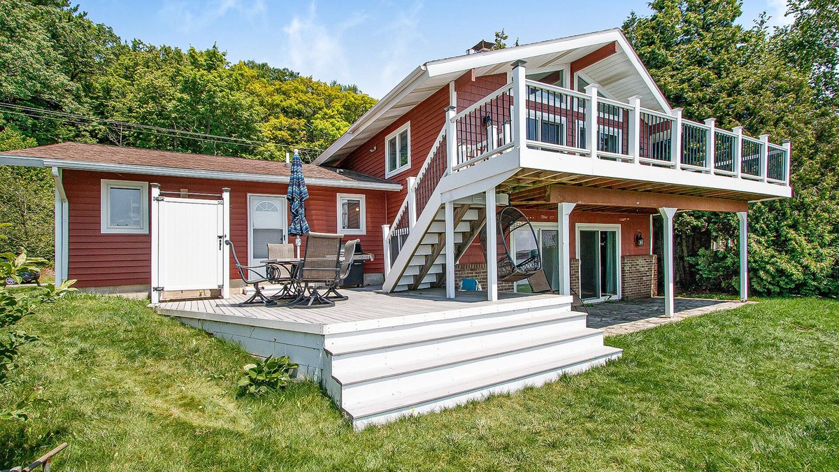 Beulah House | Dreamy escape on the water of Crystal Lake w/spacious deck & private dock