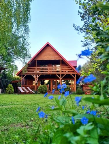 Januszkowo House | Drewniany dom z kominkiem, trasą S7 w 2h z Warszawy i Gdanska nad jezioro Mielno