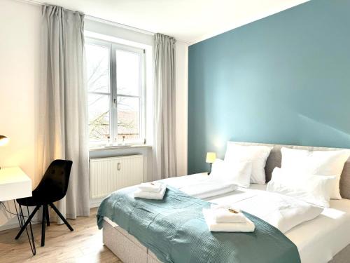 Gersthofen Apartment | E&K living - city central - design apartment - SKY-TV - free parking