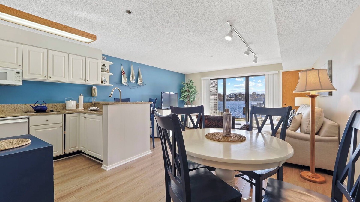 Charlevoix Condo | Edgewater Inn Condo with Waterfront Access | Pool, Hot Tub, Sauna | Sleeps 4