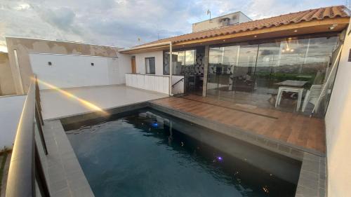 Muzambinho House | Edicula paixão
