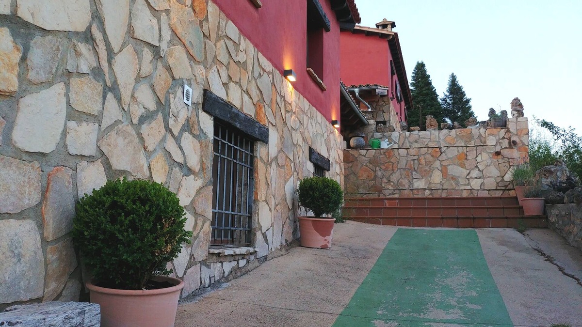 Una Cottage | El Escalerón II House | Monteagudillo Accommodation. Patio, barbecue and fireplace
