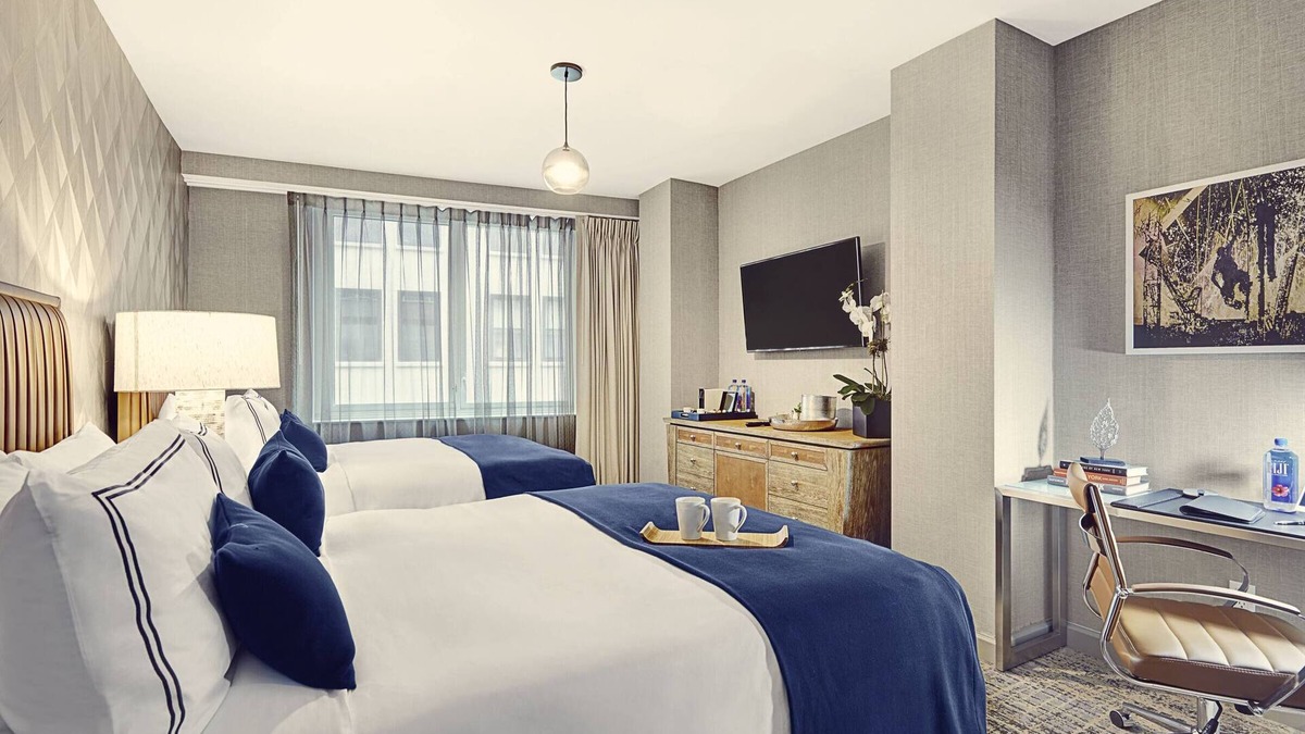 Financial District Hotel | Elegant and Spacious Room with Two Queen Beds for Ultimate Relaxation
