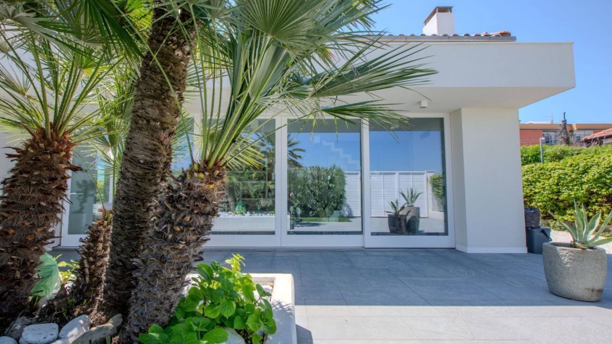 Marzocca Villa | Elegant beachfront villa with jacuzzi, garden, and panoramic terrace.